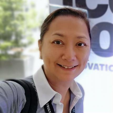 Portrait of Marixi Carlos, strategic leader and advocate for inclusion, culture-building, and employee experience